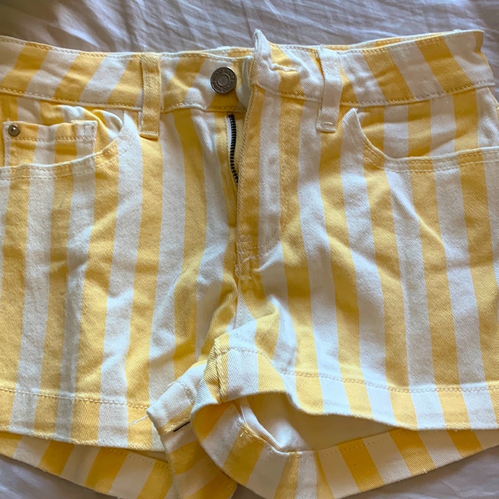 Striped white and yellow jean shorts